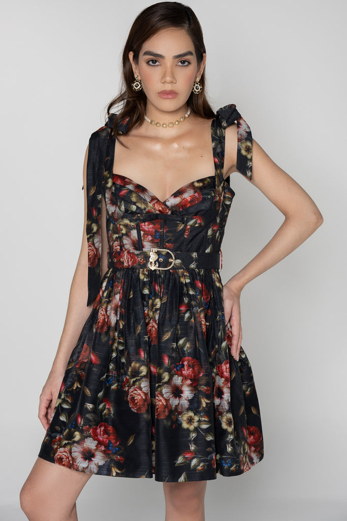 Model wearing a black floral linen-polyester summer dress by Nia & Rose.